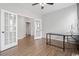 Home office with French doors, a modern desk, and ample natural light at 305 Portofino Dr., Myrtle Beach, SC 29579