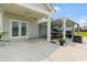 Inviting outdoor patio with pergola seating and a landscaped backyard at 305 Portofino Dr., Myrtle Beach, SC 29579