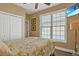 Bedroom with ceiling fan and a window with blinds at 305 Shuffleboard Ct., Myrtle Beach, SC 29572