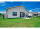 Exterior backyard shows patio for grilling & chilling plus well-maintained lawn at 316 Lifestyle Court, Surfside Beach, SC 29575