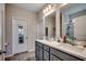 Bathroom with double vanity, modern fixtures, and separate shower room at 316 Lifestyle Court, Surfside Beach, SC 29575