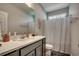Neutral bathroom featuring a vanity and shower with gray accents at 316 Lifestyle Court, Surfside Beach, SC 29575