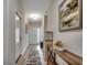 Inviting hallway featuring wood floors, neutral paint, and decorative accents at 316 Lifestyle Court, Surfside Beach, SC 29575