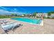 Community pool with lounge chairs is perfect for relaxing and enjoying the summer sun at 316 Lifestyle Court, Surfside Beach, SC 29575