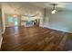 Spacious living room featuring hardwood floors, modern lighting, and an open layout at 3204 Fowler School Rd., Loris, SC 29569