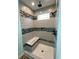 Tiled shower with a built-in bench, mosaic accents, and a rainfall shower head at 3204 Fowler School Rd., Loris, SC 29569