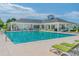 Beautiful community pool with lounge chairs and shade, perfect for relaxation and social gatherings at 379 Mikita Dr., Surfside Beach, SC 29575