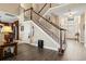 Welcoming two-story foyer leads to the staircase and features luxury vinyl plank flooring throughout at 400 Dog Pen Ct., Myrtle Beach, SC 29588