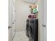 A functional laundry room features a washer, dryer, and shelving at 400 Dog Pen Ct., Myrtle Beach, SC 29588