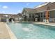 Backyard pool with water features and an outdoor kitchen, great for entertaining and relaxation at 400 Dog Pen Ct., Myrtle Beach, SC 29588