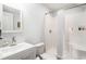 Bathroom featuring a modern vanity, and tub/shower combo with a white shower curtain, perfect for relaxation at 400 Summerwood Ct., Myrtle Beach, SC 29579
