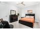 Bright bedroom featuring a ceiling fan, and modern furnishings, creating a serene and stylish space at 400 Summerwood Ct., Myrtle Beach, SC 29579