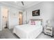 Cozy bedroom with neutral colors, a comfortable bed, and an attached ensuite at 400 Summerwood Ct., Myrtle Beach, SC 29579