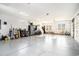 Spacious three car garage with epoxy floors and plenty of space for parking and storage at 400 Summerwood Ct., Myrtle Beach, SC 29579