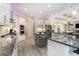 Modern kitchen features recessed lighting, pendant lights, granite counters, and an open design for easy entertaining at 400 Summerwood Ct., Myrtle Beach, SC 29579