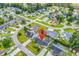 Aerial view of a residential neighborhood featuring homes with well-maintained lawns and mature trees at 405 Flagstone Dr., Myrtle Beach, SC 29588