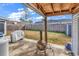 Back patio with a barbecue grill and fenced yard at 405 Flagstone Dr., Myrtle Beach, SC 29588