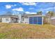 Home backyard with patio, shed, and screened in patio at 405 Flagstone Dr., Myrtle Beach, SC 29588