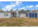 Home backyard with patio, shed, and screened in patio at 405 Flagstone Dr., Myrtle Beach, SC 29588