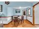 Light filled dining room with seating for four and beach themed decor at 405 Flagstone Dr., Myrtle Beach, SC 29588