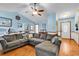 Spacious living room with hardwood floors, comfortable seating and natural light at 405 Flagstone Dr., Myrtle Beach, SC 29588
