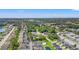 Panoramic aerial shot of The Gardens at Cypress Bay with lush trees, ponds, and community amenities at 4142 Hibiscus Dr. # 20-202, Little River, SC 29566