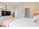 Bedroom featuring a view of the living area and bathroom, filled with natural light at 4142 Hibiscus Dr. # 20-202, Little River, SC 29566