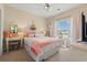 Cozy bedroom with soft colors, a plush bed, and a decorative vanity at 4142 Hibiscus Dr. # 20-202, Little River, SC 29566