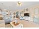 Inviting open-concept living area with kitchen, dining, and a cozy seating area at 4142 Hibiscus Dr. # 20-202, Little River, SC 29566