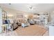Bright and open living space connecting living, dining, and kitchen areas at 4142 Hibiscus Dr. # 20-202, Little River, SC 29566