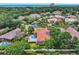 Beautiful aerial view of upscale community with mature landscaping, pools, and tile roofs at 434 Posada Dr., Myrtle Beach, SC 29572