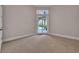 Bedroom with patio access and neutral carpet at 434 Posada Dr., Myrtle Beach, SC 29572