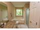 Bathroom featuring a sink with granite counters, a toilet, and a shower-tub combination at 4370 Crepe Myrtle Ct. # F, Murrells Inlet, SC 29576