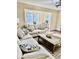 Inviting living room with comfortable seating and a view into a sunlit office space at 4370 Crepe Myrtle Ct. # F, Murrells Inlet, SC 29576