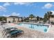 Relaxing community pool with lounge chairs, perfect for summer days and outdoor recreation at 4445 Kingsport Rd. # 101, Little River, SC 29566