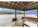 Charming gazebo with seating offers picturesque water views for relaxation and enjoyment at 4445 Kingsport Rd. # 101, Little River, SC 29566