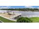 Outdoor patio with seating, sun umbrellas, and waterfront views, perfect for enjoying the scenery and water activities at 4445 Kingsport Rd. # 101, Little River, SC 29566
