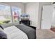 This is a spare bedroom featuring a dark bed frame and TV at 447 Honeyhill Loop, Conway, SC 29526
