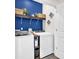 This is a laundry room with front load washer/dryer and decor shelving at 447 Honeyhill Loop, Conway, SC 29526