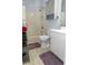 Well-lit bathroom with a shower-tub combination, sleek vanity, and tiled floors at 4505 N Kings Hwy. # E2, Myrtle Beach, SC 29577