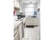 Bright kitchen featuring white cabinetry, appliances, and plenty of counter space at 4505 N Kings Hwy. # E2, Myrtle Beach, SC 29577