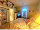 Cozy bedroom featuring a comfortable bed, closet, and ensuite bathroom with shower at 4753 Wild Iris Dr. # 301, Myrtle Beach, SC 29577
