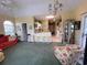 Spacious living room offers views into kitchen, comfortable seating, and ample natural light at 4753 Wild Iris Dr. # 301, Myrtle Beach, SC 29577