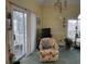 Comfortable living room features a large sliding glass door for natural light and neutral color palette at 4753 Wild Iris Dr. # 301, Myrtle Beach, SC 29577