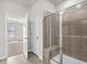 Beautiful bathroom showcasing a tiled shower, a seat, and natural light at 4846 Hopespring St., Myrtle Beach, SC 29579