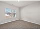 Comfortable bedroom with natural light and soft carpeting at 4846 Hopespring St., Myrtle Beach, SC 29579
