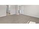 Neutral bedroom featuring soft carpeting and access to the bathroom at 4846 Hopespring St., Myrtle Beach, SC 29579