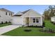Charming single-story home with a gray exterior, well-manicured lawn, and a two-car garage at 4846 Hopespring St., Myrtle Beach, SC 29579