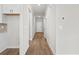 Hallway with durable laminate flooring and bright recessed lighting at 4846 Hopespring St., Myrtle Beach, SC 29579
