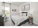 Serene bedroom with soft lighting, comfortable bed, and stylish decor at 4877 Hopespring St., Myrtle Beach, SC 29579